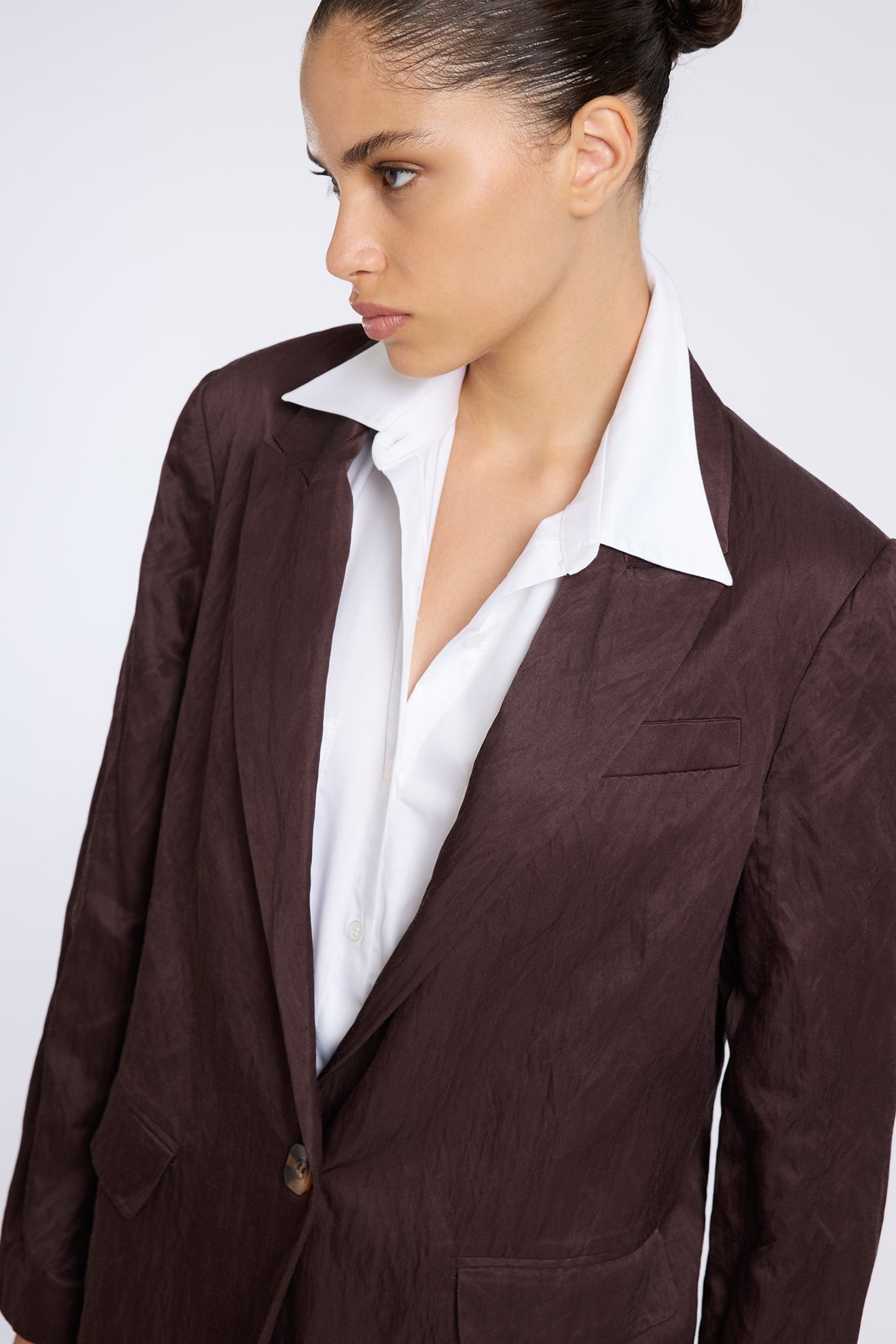 WRINKLED LOOKING BROWN SHINY JACKET