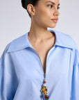PETUNYA BLUE SHIRT WITH BEADED ZIP DETAIL
