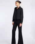 FLARED BLACK PANTS WITH BUTTON DETAIL