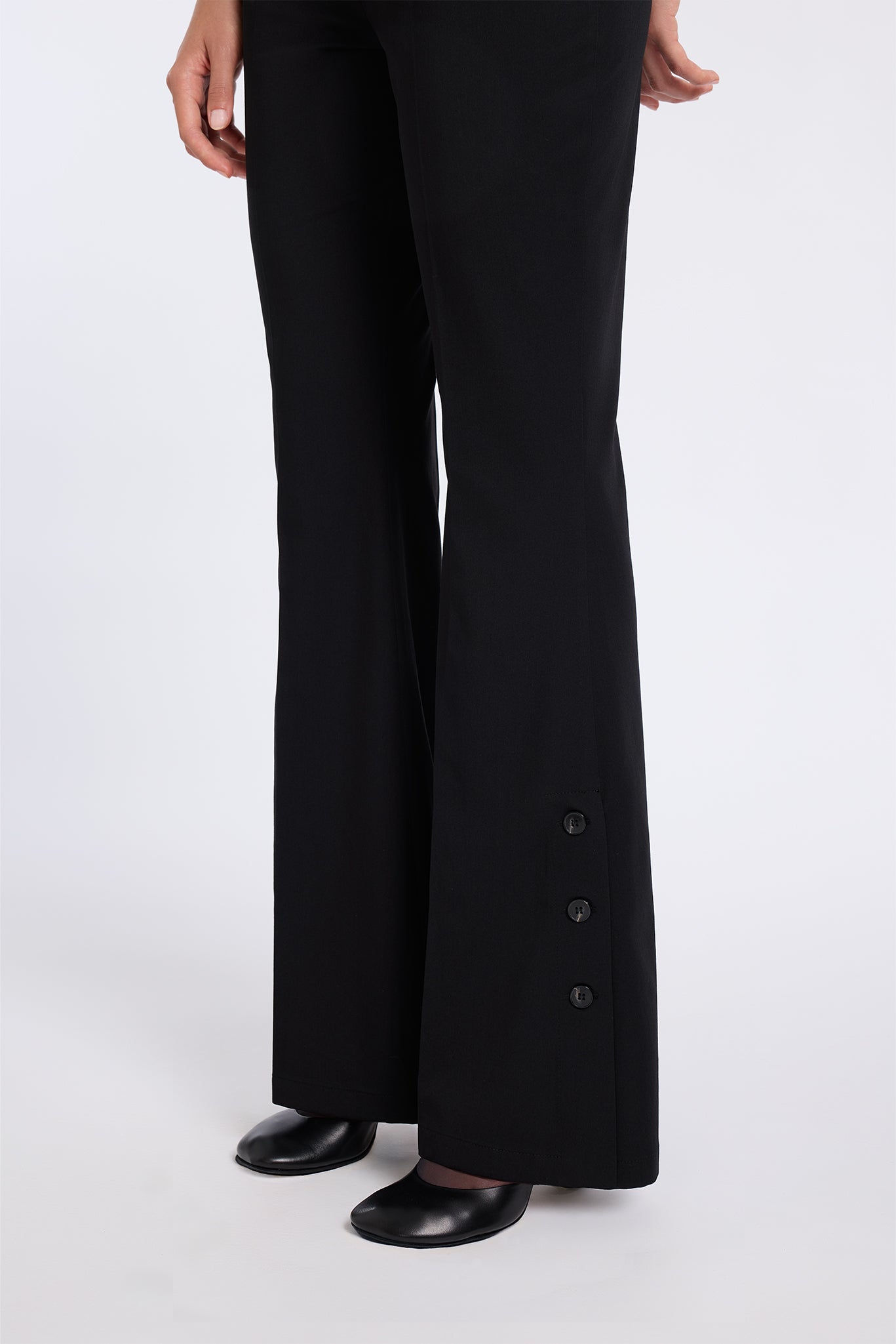 FLARED BLACK PANTS WITH BUTTON DETAIL
