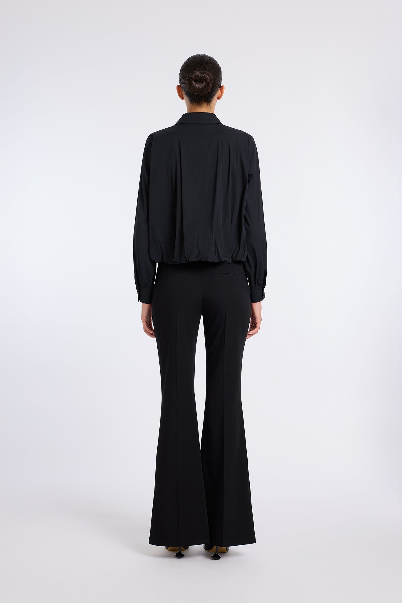 FLARED BLACK PANTS WITH BUTTON DETAIL